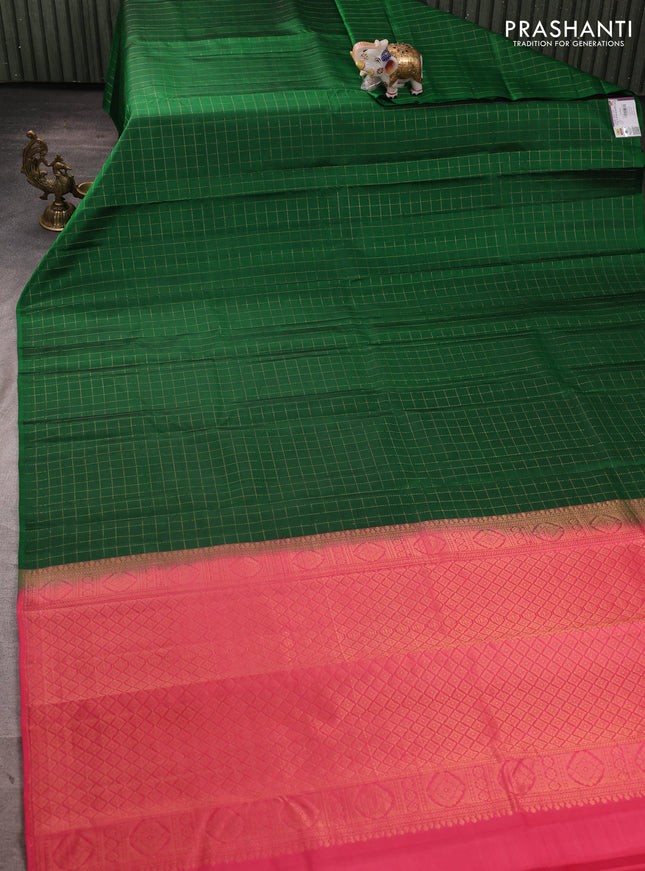 Pure kanchipuram silk saree green and peach pink with allover zari checked pattern in borderless style