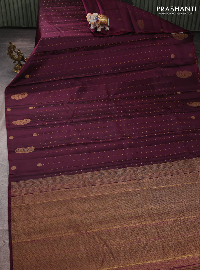Pure kanchipuram silk saree wine shade with allover zari woven buttas in borderless style