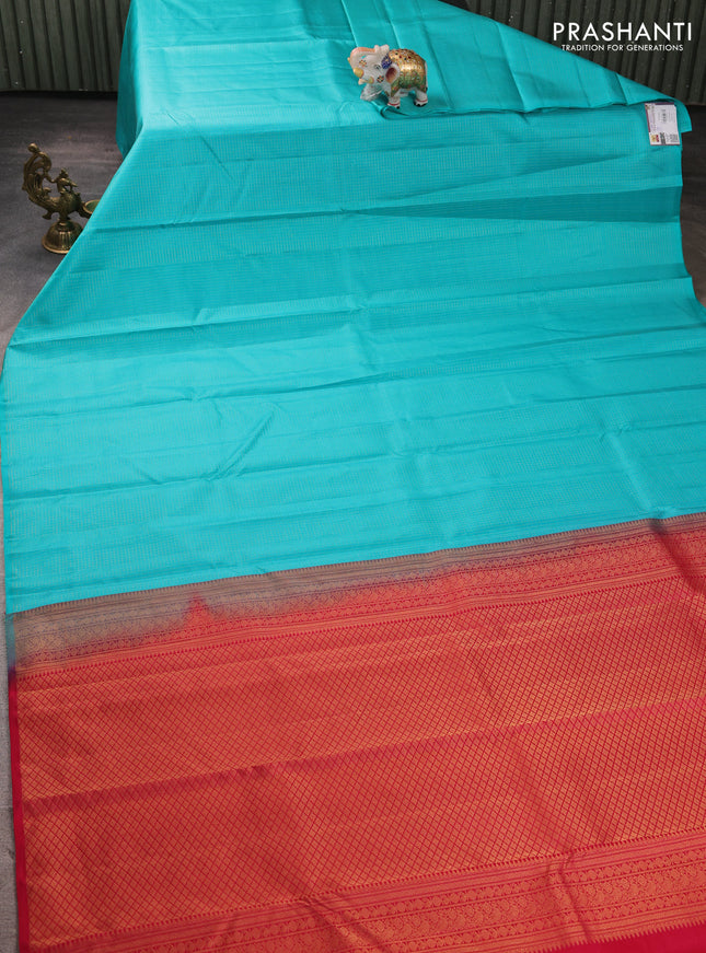 Pure kanchipuram silk saree teal blue and pink with allover zari checked pattern in borderless style