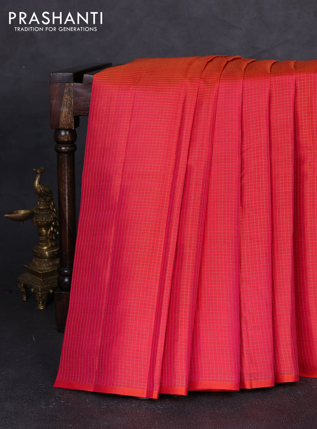 Pure kanchipuram silk saree orange with allover zari checked pattern in borderless style