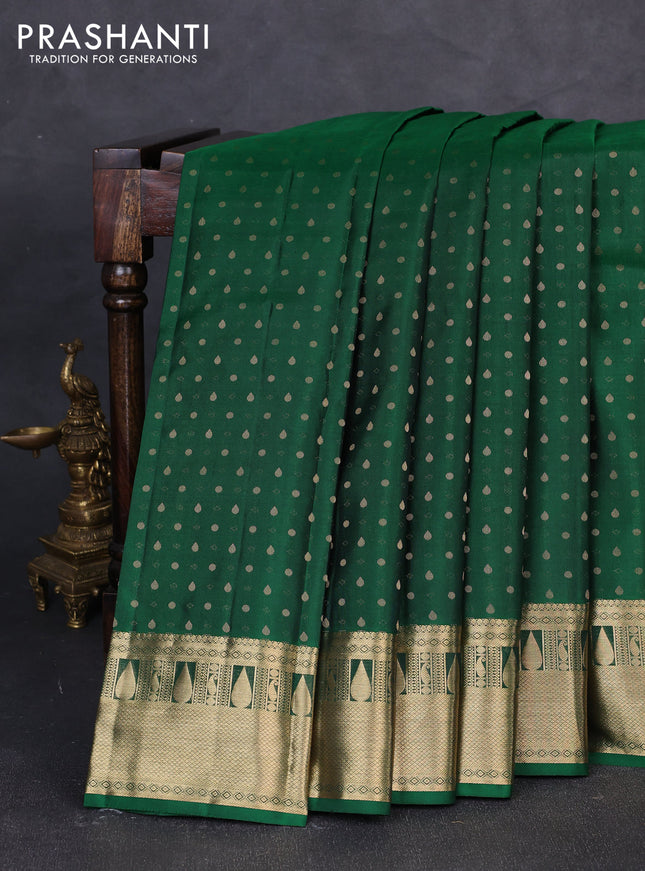 Pure kanchipuram silk saree green and mauve pink with allover zari woven buttas and zari woven korvai border