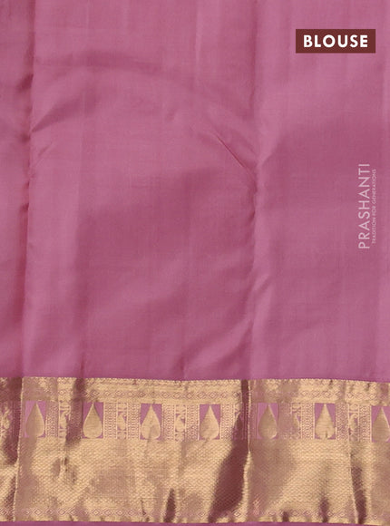 Pure kanchipuram silk saree green and mauve pink with allover zari woven buttas and zari woven korvai border