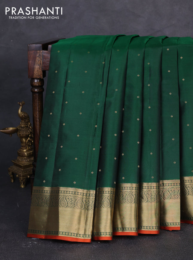 Pure kanchipuram silk saree green and rust shade with allover zari woven buttas and zari woven korvai border