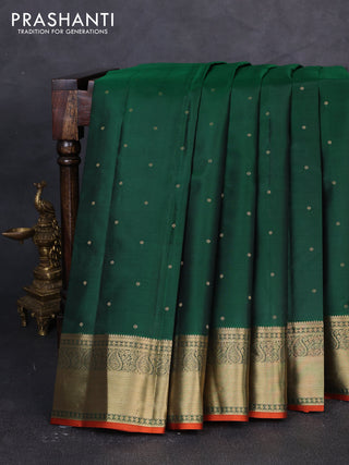 Pure kanchipuram silk saree green and rust shade with allover zari woven buttas and zari woven korvai border