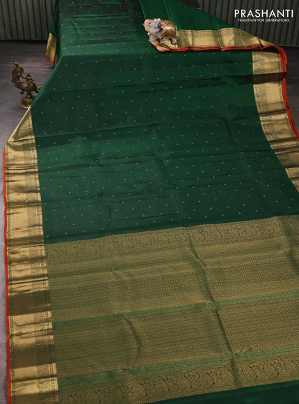 Pure kanchipuram silk saree green and rust shade with allover zari woven buttas and zari woven korvai border