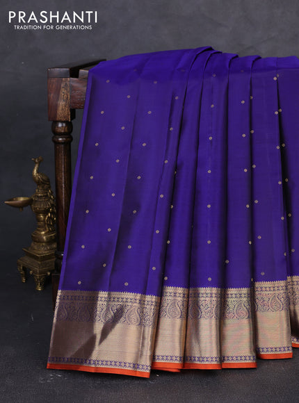 Pure kanchipuram silk saree blue and rust shade with allover zari woven buttas and zari woven korvai border