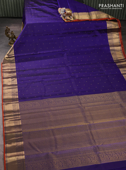 Pure kanchipuram silk saree blue and rust shade with allover zari woven buttas and zari woven korvai border