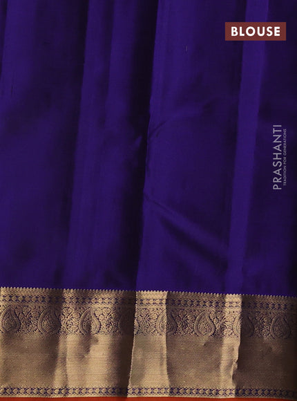 Pure kanchipuram silk saree blue and rust shade with allover zari woven buttas and zari woven korvai border