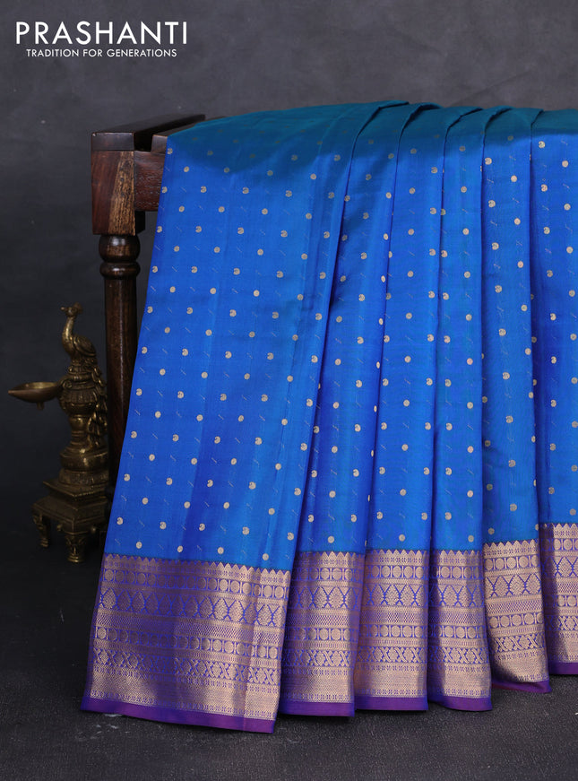Pure kanchipuram silk saree blue and violet with allover zari woven buttas and zari woven korvai border