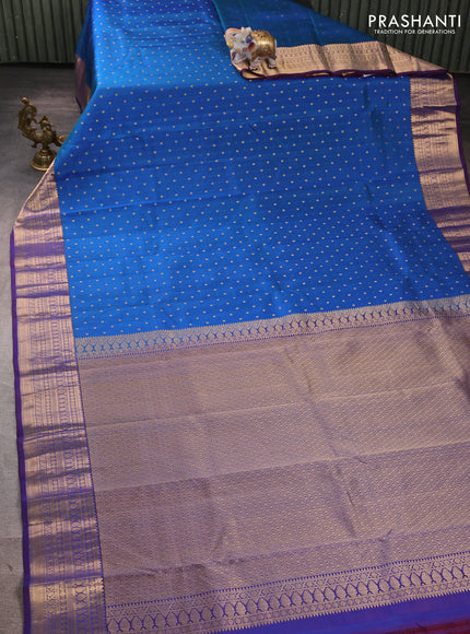 Pure kanchipuram silk saree blue and violet with allover zari woven buttas and zari woven korvai border