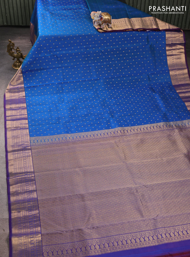 Pure kanchipuram silk saree blue and violet with allover zari woven buttas and zari woven korvai border