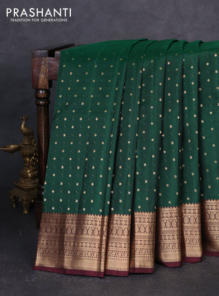 Pure kanchipuram silk saree green and coffee brown with allover zari woven buttas and zari woven korvai border