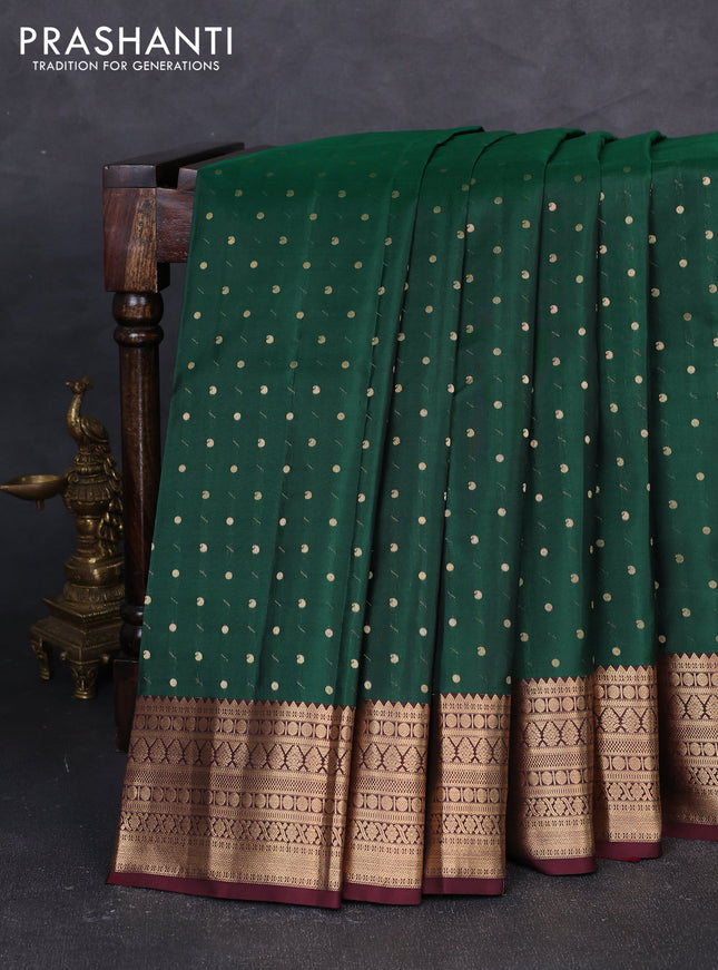 Pure kanchipuram silk saree green and coffee brown with allover zari woven buttas and zari woven korvai border