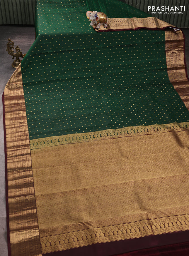 Pure kanchipuram silk saree green and coffee brown with allover zari woven buttas and zari woven korvai border