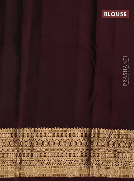 Pure kanchipuram silk saree green and coffee brown with allover zari woven buttas and zari woven korvai border