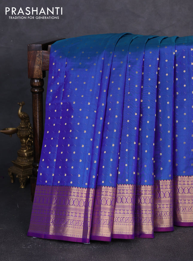 Pure kanchipuram silk saree blue and purple with allover zari woven buttas and zari woven korvai border