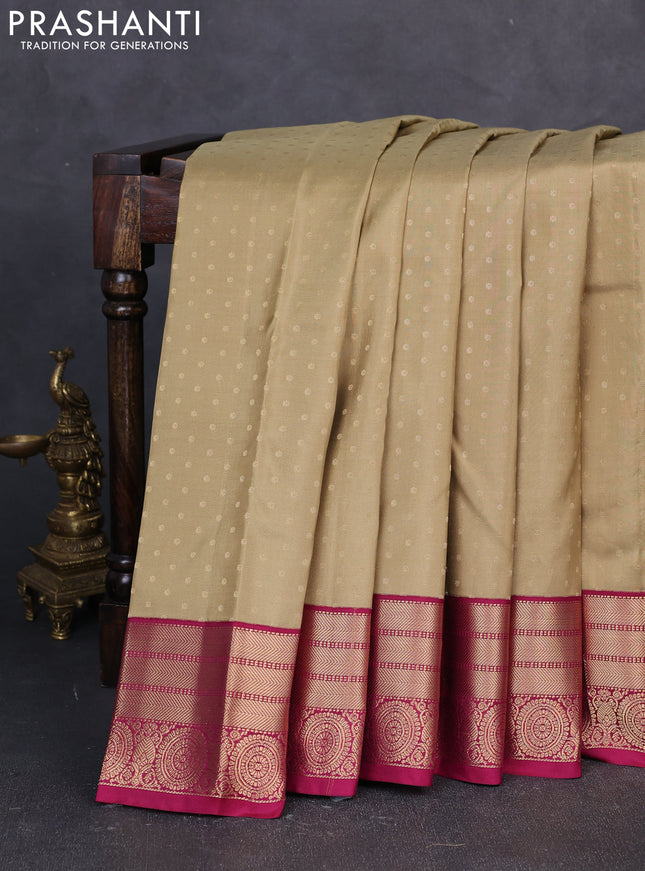 Pure kanchipuram silk saree elaichi green and wine shade with allover zari woven buttas and zari woven korvai border