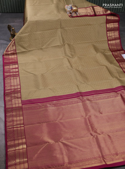 Pure kanchipuram silk saree elaichi green and wine shade with allover zari woven buttas and zari woven korvai border