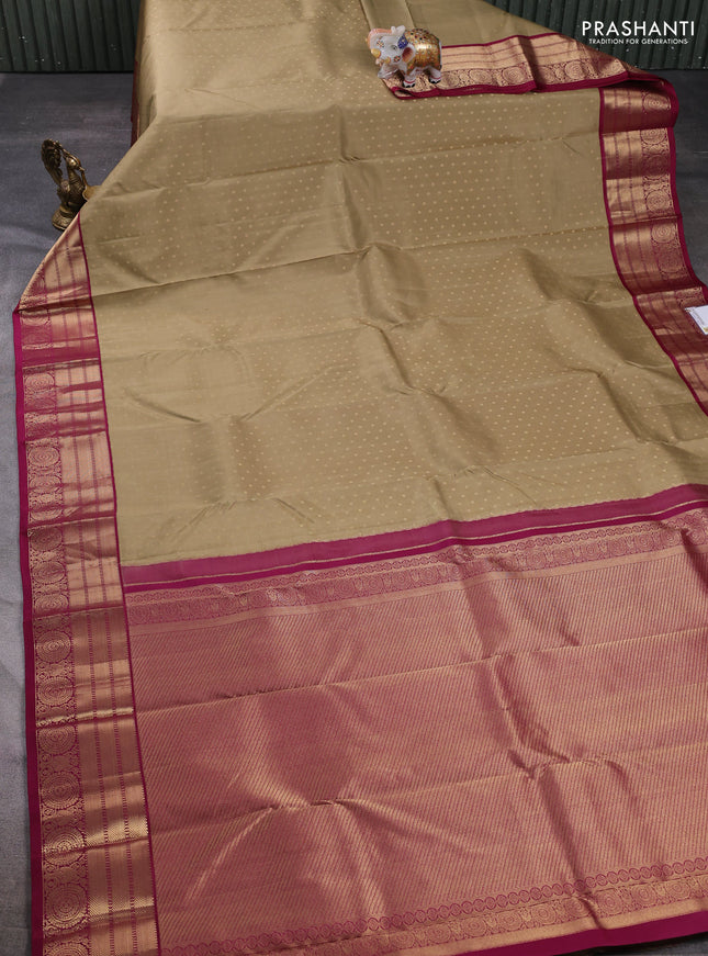 Pure kanchipuram silk saree elaichi green and wine shade with allover zari woven buttas and zari woven korvai border