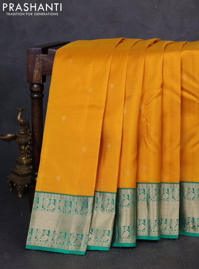 Pure kanchipuram silk saree mustard yellow and green with zari woven buttas and zari woven korvai border
