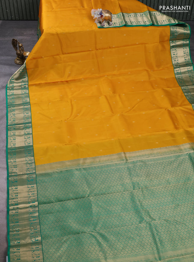 Pure kanchipuram silk saree mustard yellow and green with zari woven buttas and zari woven korvai border