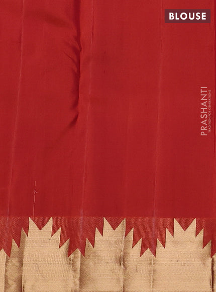 Pure kanchipuram silk saree rust shade with plain body and temple zari woven border