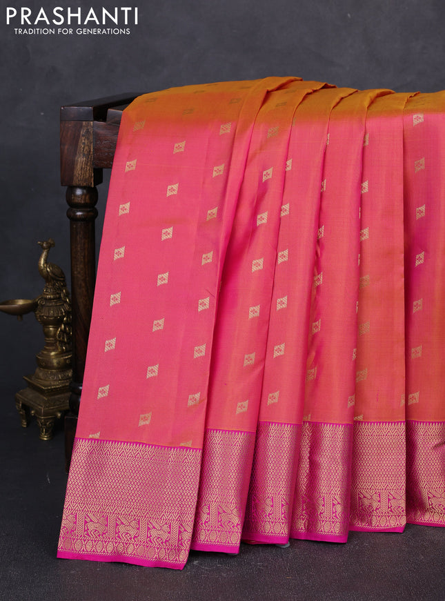 Pure kanchipuram silk saree dual shade of pinkish orange and pink with allover zari woven buttas and zari woven border