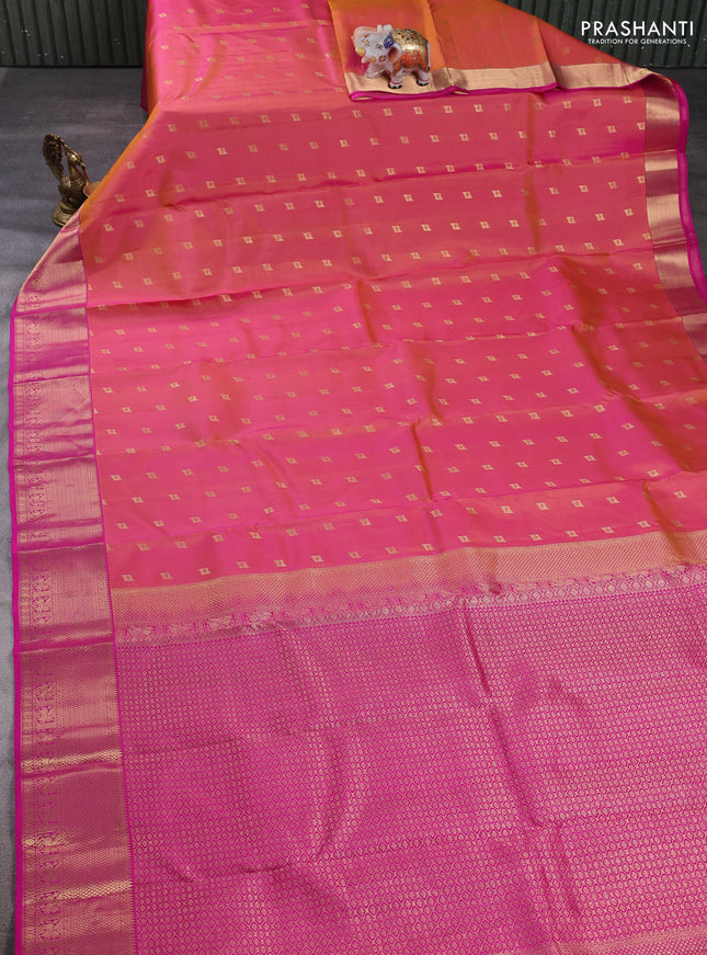 Pure kanchipuram silk saree dual shade of pinkish orange and pink with allover zari woven buttas and zari woven border