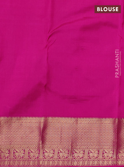 Pure kanchipuram silk saree dual shade of pinkish orange and pink with allover zari woven buttas and zari woven border
