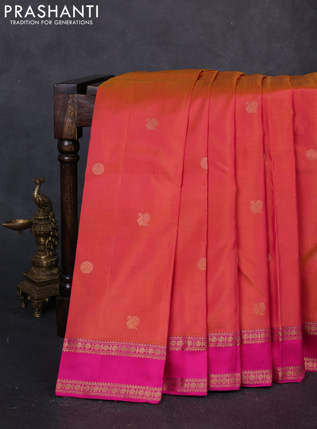 Pure kanchipuram silk saree dual shad of pinkish orange and pink with zari woven buttas and rettapet zari woven border