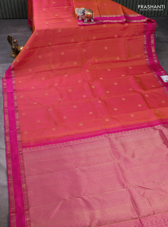 Pure kanchipuram silk saree dual shad of pinkish orange and pink with zari woven buttas and rettapet zari woven border