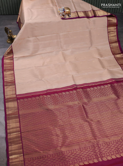 Pure kanchipuram silk saree beige and purple with zari woven buttas and zari woven korvai border