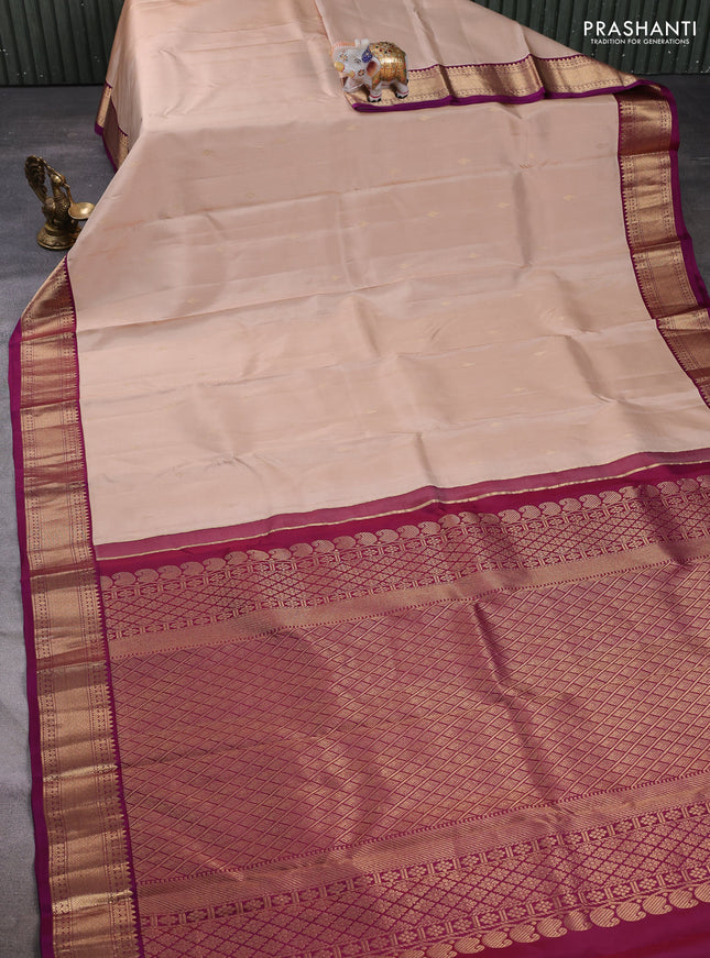 Pure kanchipuram silk saree beige and purple with zari woven buttas and zari woven korvai border