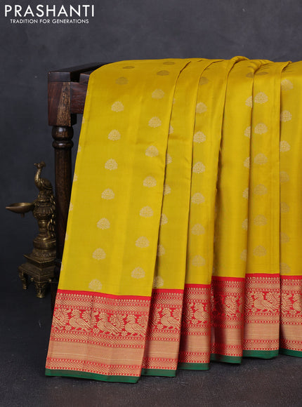 Pure kanchipuram silk saree mustard yellow and red with allover zari woven buttas and zari woven korvai border