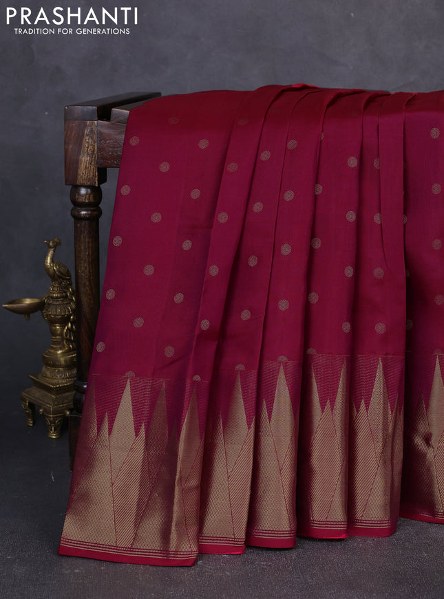 Pure kanchipuram silk saree maroon with allover zari woven buttas and temple zari woven border