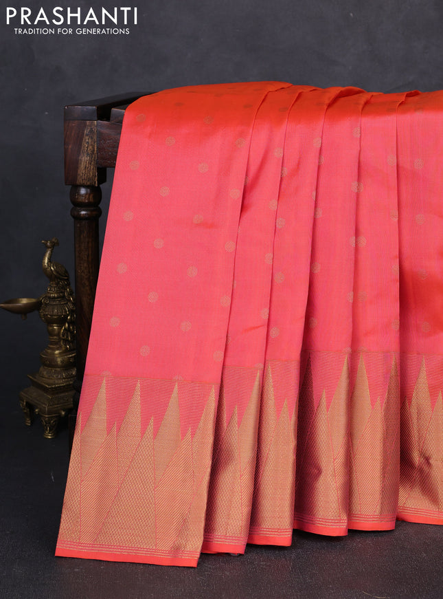 Pure kanchipuram silk saree orange with allover zari woven buttas and temple zari woven border