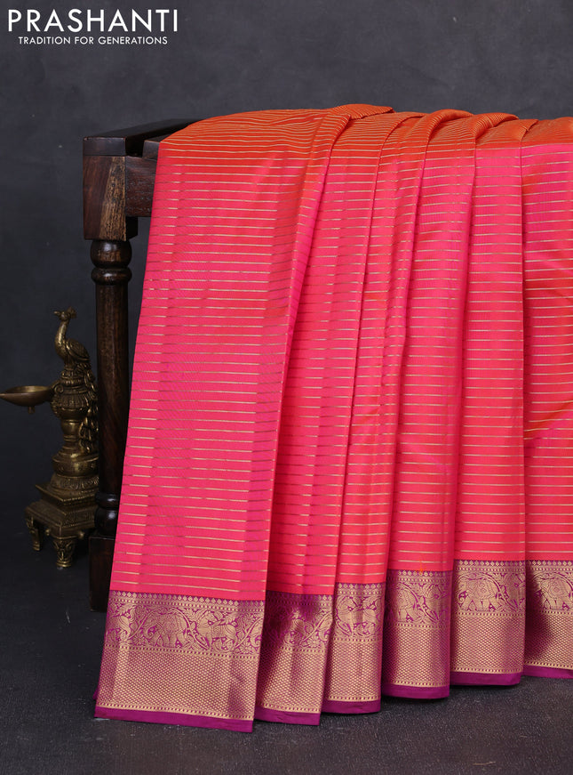 Pure kanchipuram silk saree dual shade of pinkish orange and pink with allover zari stripe pattern and zari woven border