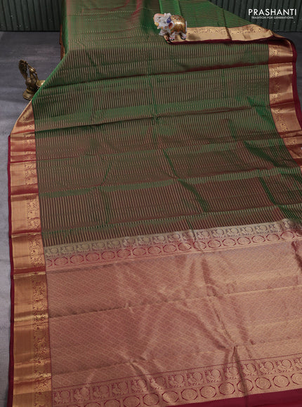Pure kanchipuram silk saree green and deep maroon with allover zari stripe pattern and zari woven border