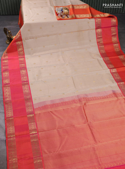 Pure kanchipuram silk saree cream and orange with allover zari checks & buttas and long rettapet zari woven border