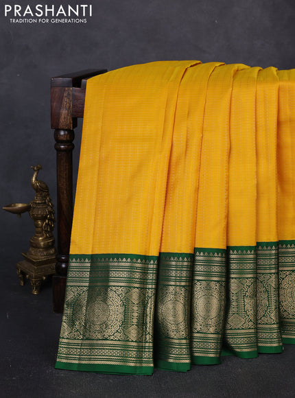 Pure kanchipuram silk saree yellow and green with allover zari checks & buttas and long zari woven korvai border