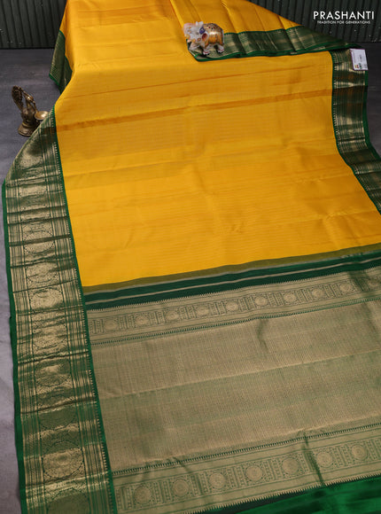 Pure kanchipuram silk saree yellow and green with allover zari checks & buttas and long zari woven korvai border