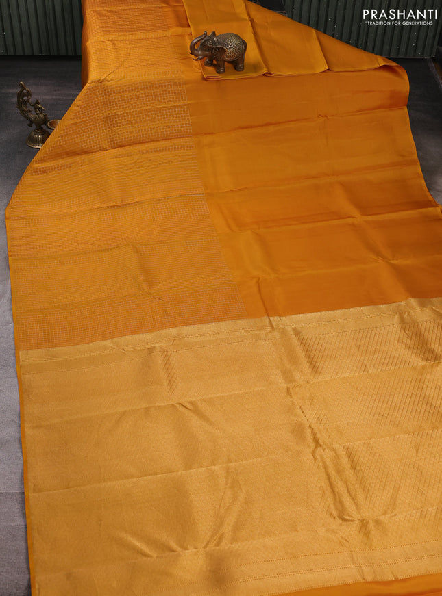 Pure kanchipuram silk saree dark mustard with half & half style and long zari woven checked border