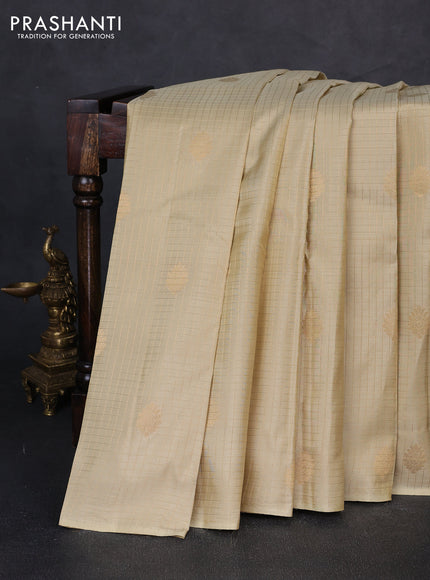 Pure kanchipuram silk saree beige with allover small zari checks & buttas in borderless style