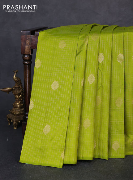 Pure kanchipuram silk saree light green with allover small zari checks & buttas in borderless style