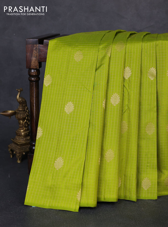 Pure kanchipuram silk saree light green with allover small zari checks & buttas in borderless style