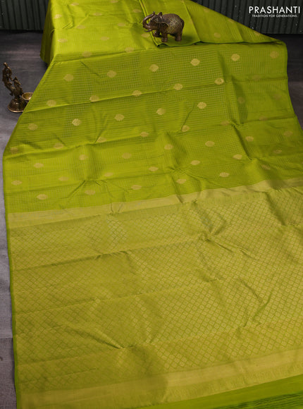 Pure kanchipuram silk saree light green with allover small zari checks & buttas in borderless style