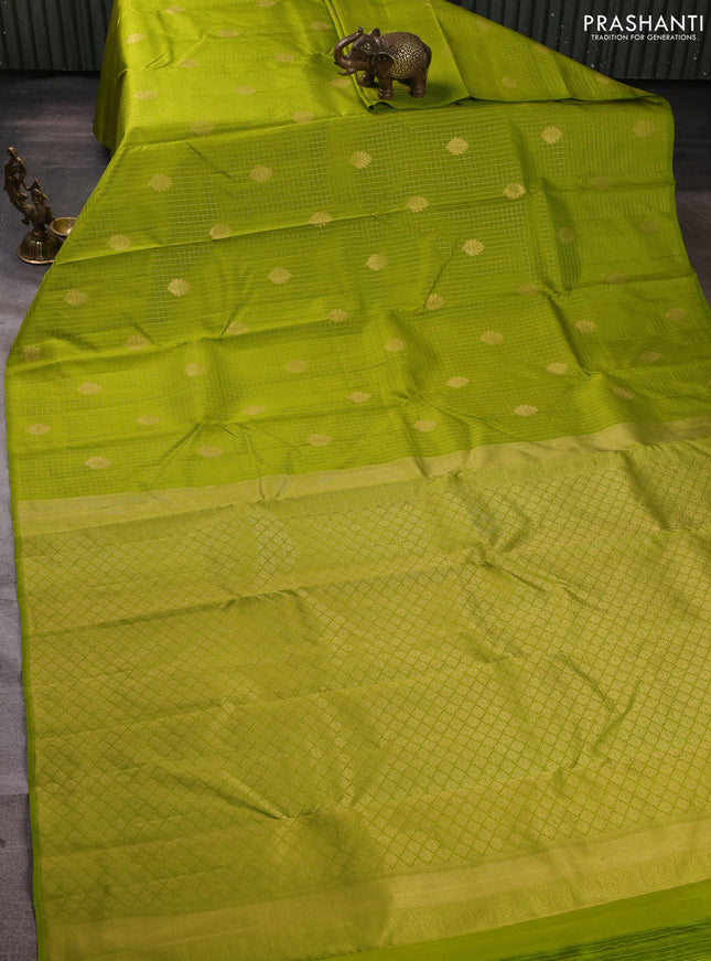 Pure kanchipuram silk saree light green with allover small zari checks & buttas in borderless style