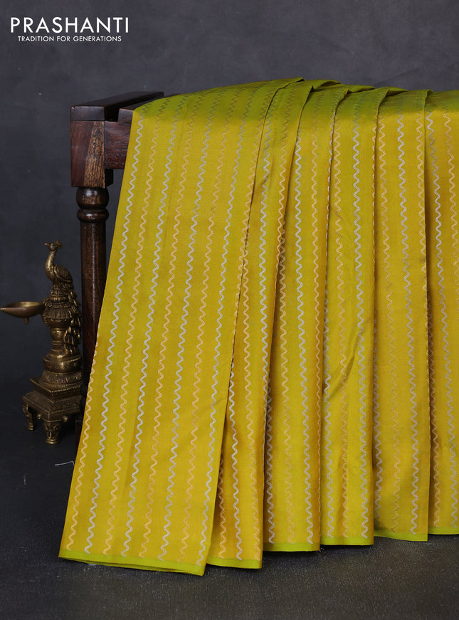Pure kanchipuram silk saree lime green and lavender with allover silver & gold zari weaves in borderless style