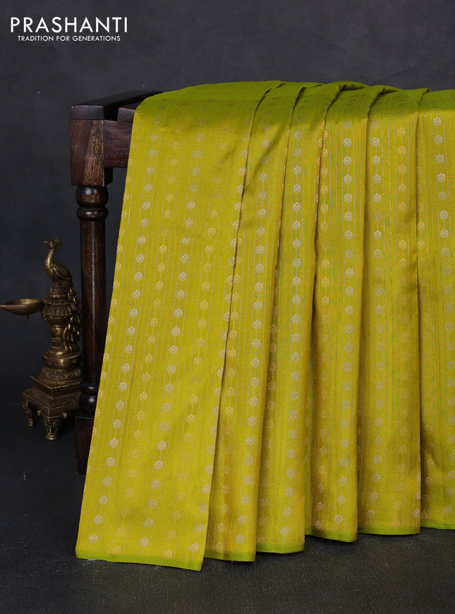 Pure kanchipuram silk saree lime green with half & half style and long zari woven border