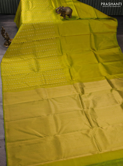 Pure kanchipuram silk saree lime green with half & half style and long zari woven border